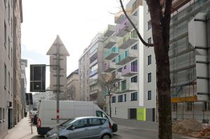 Rendering einer Wohnhausanlage in eine bestehende Straße in Wien (Paschinger Architekten)